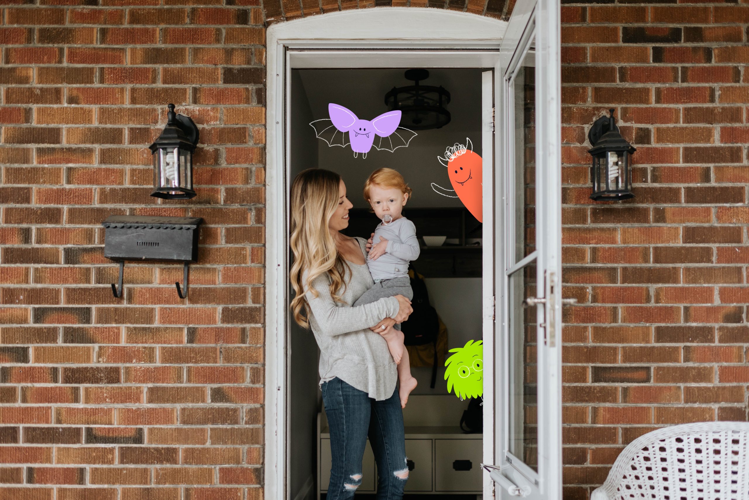 mother-with-son-at-front-door-of-house